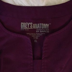 Grey's Anatomy Tops - Grey’s Anatomy Ladies Scrub Top in Purple Grey's Anatomy Tops - Grey’s Anatomy Ladies Scrub Top in Purple